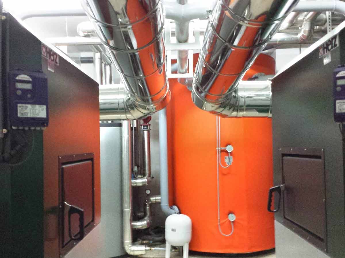 David Calefacción Saneamiento y Gas caldera naranja